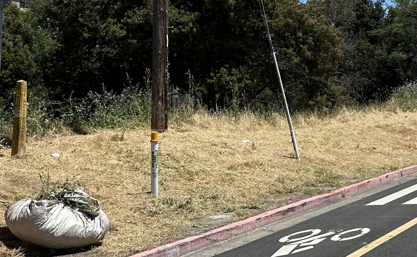 Bicyclists in two-way separated bikeway in Burlingame, CA