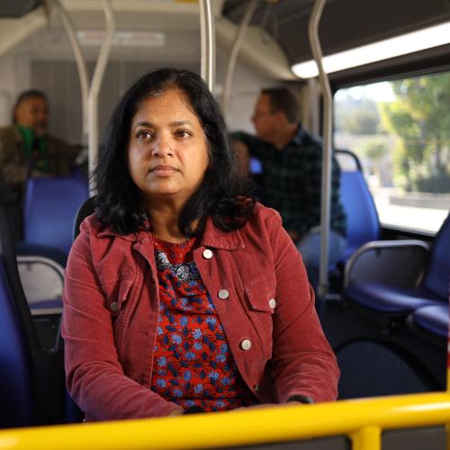 Passenger looks out of window on SamTrans bus