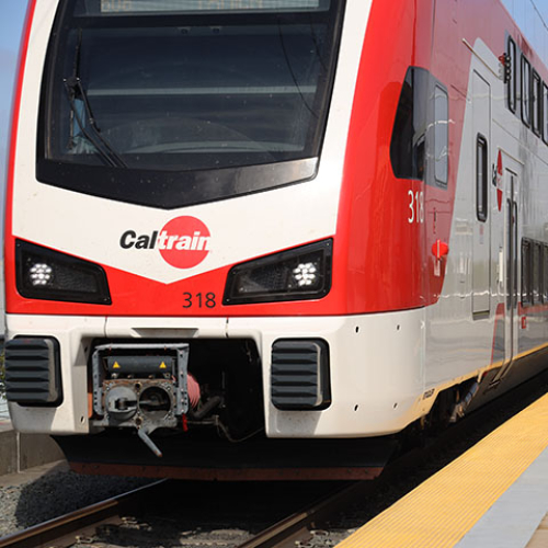 Kid waiting for the Caltrain
