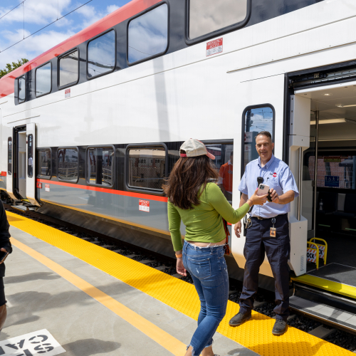 Conductor checking in passengers